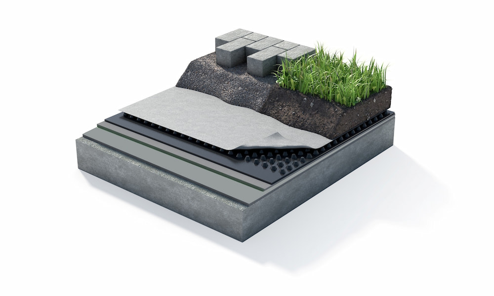 cross section of a horizontally installed geodrain underneath a green roof