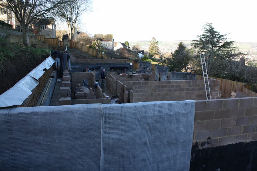 a new build showing external waterproofing and  cavity drainage being installed