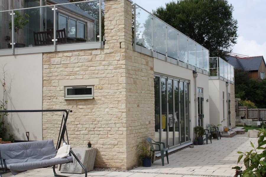 photo of a completed build with external stonework in place