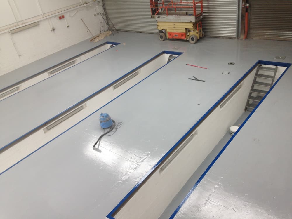 garage floor with a new application of epoxy floor coating