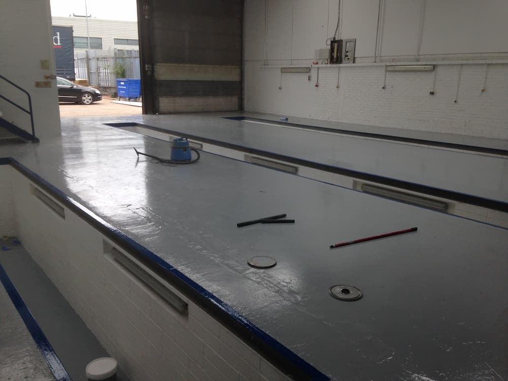 commercial garage in Bristol with a new epoxy floor coating